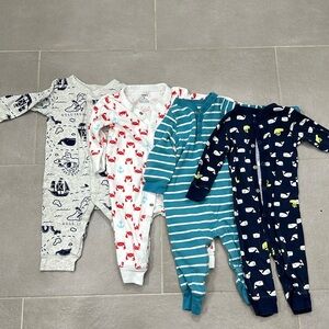 Bundle of Carter’s snap sleep and play outfits